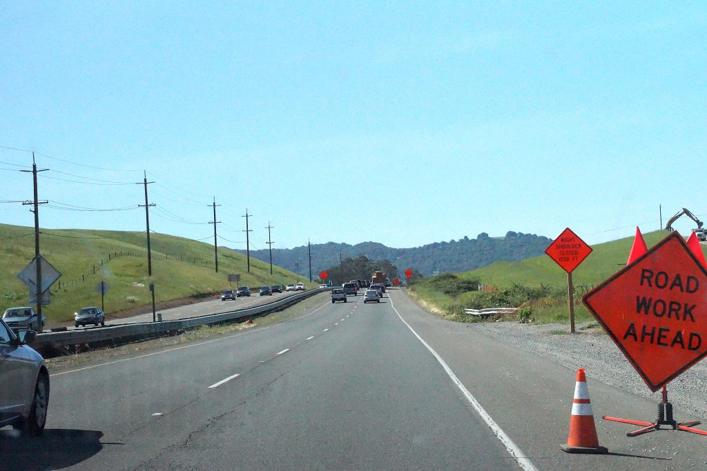 Emergency Ride Home Highway road and cars